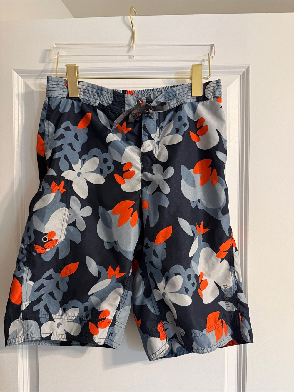 Patagonia Boys  Floral Swim Shorts in Navy, Light Blue & Orange size 14
